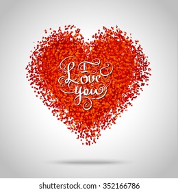 Red frame in the shape of a heart made of golden confetti on white background.