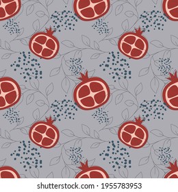 Red garnet on blue background fruit seamless pattern. Vector illustration of an infinite pattern with linear leaves and colored drops. Ripe juicy fruits in a flat linear style.