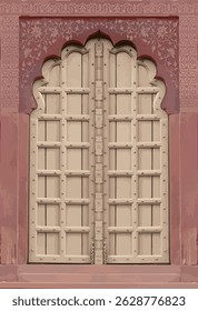Red gate door in City Palace of Jaipur, Rajasthan, India . Background illustration red and Maroon.