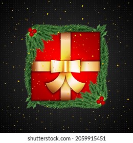 red gift box design with pine leaves around it