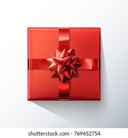 Red gift box, with red ribbon and bow. Realistic isolated gift box. Flat lay, top view. Vector illustration. Decoration element for holiday design, Christmas, New Year, Birthday, Valentines day