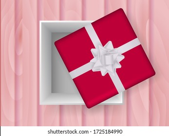 Red Gift box with silver bow on a wooden board. Vector stock illustration for poster