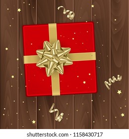 Red gift box, top view, gift box on wooden background with golden bow, vector illustration
