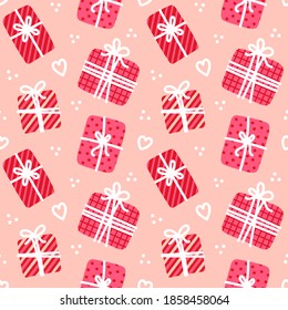 Red gift boxes on pink background seamless pattern. Valentine's day presents, parcels and hearts on pastel pink background wrapping paper. Distance gifting romantic mail illustration.