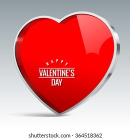 Red glossy element in the shape of a heart with shiny metal trim. The symbol for design
