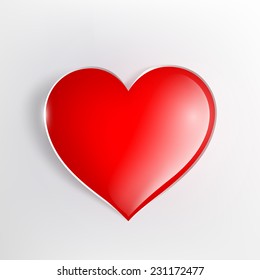 red glowing heart on a light background