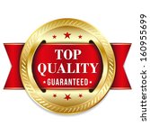 Red gold top quality badge with ribbon.