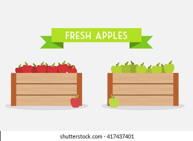 Red and green apples in the wooden box