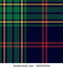 Red, green, blue, yellow plaid pattern tartan Christmas. Herringbone textured seamless dark bright winter check plaid for flannel shirt, blanket, duvet cover, tablecloth, other classic textile print.