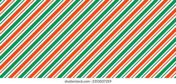 Red and green Christmas seamless pattern. Candy cane diagonal stripes background. Repeating decoration wallpaper. Winter holidays lines backdrop. Xmas peppermint present wrapping print design. Vector