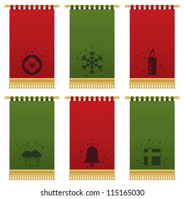 red and green christmas wall hangings with gold tassel fringing, isolated on white