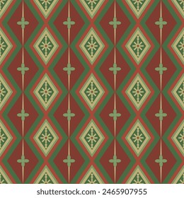 A red and green patterned fabric with a diamond shape design. The pattern is made up of squares and triangles