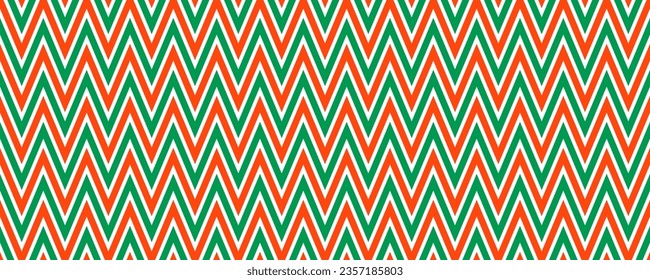 Red and green seamless pattern. Candy cane zigzag stripes background. Christmas repeating decoration wallpaper. Winter holiday lines backdrop. Xmas peppermint gift wrapping print. Vector