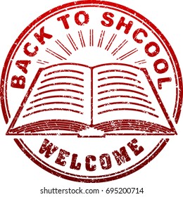 Red grunge style rubber stamp with book, sunburst and caption Back to school written inside the stamp