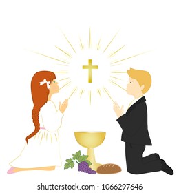 Red hair boy and girl praying on knees. First holy communion ceremony.