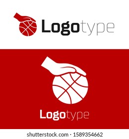 Red Hand with basketball ball icon isolated on white background. Sport symbol. Logo design template element. Vector Illustration