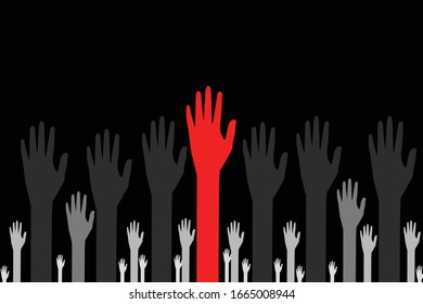 red hand  between other hands on black background