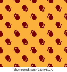 Red Hand grenade icon isolated seamless pattern on brown background. Bomb explosion.  Vector Illustration