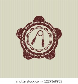 Red hand gripper icon inside grunge style stamp