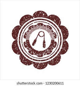 Red hand gripper icon inside distress rubber grunge texture seal
