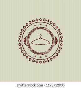 Red hanger icon inside rubber seal
