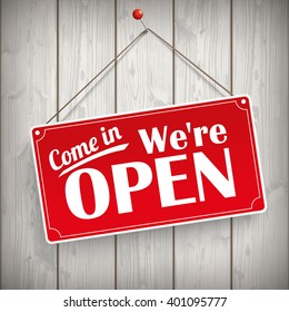 Red hanging sign with text "Come in, we're open".  Eps 10 vector file.