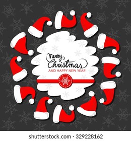 red hats of Santa Claus wreath Christmas winter holidays card with wishes in English badge on dark background