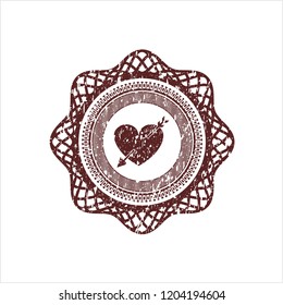 Red heart with arrow icon inside distressed grunge style stamp