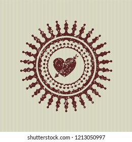 Red heart with arrow icon inside grunge style stamp
