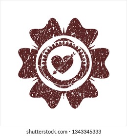 Red heart with arrow icon inside distress with rubber seal texture