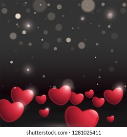 Red heart decorated black bokeh background for Valentine's Day celebration.