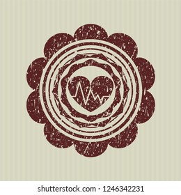 Red heart with electrocardiogram icon inside distressed rubber seal