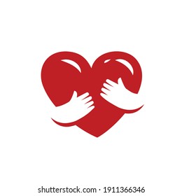 Red heart in hands. Love, health symbol vector