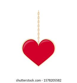 Red heart locket on a gold chain, a symbol of love. Valentine's day gift.