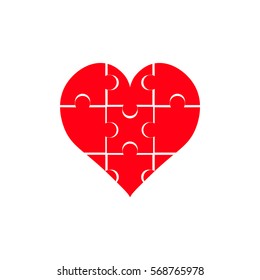 red heart made of puzzles on a white background. vector illustration