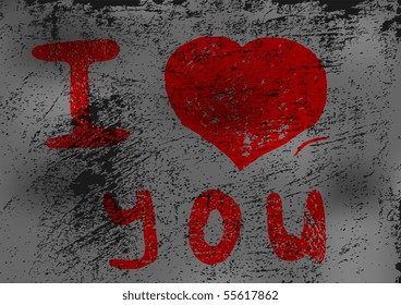 Corazón rojo en una pared gris