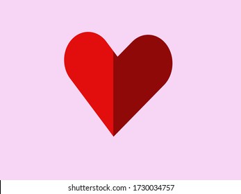 
El corazón rojo en un fondo rosado.