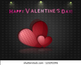 red heart with a reflection on the abstract dark background