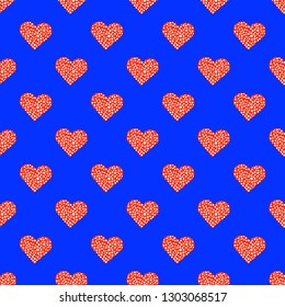Red heart seamless pattern on the blue background