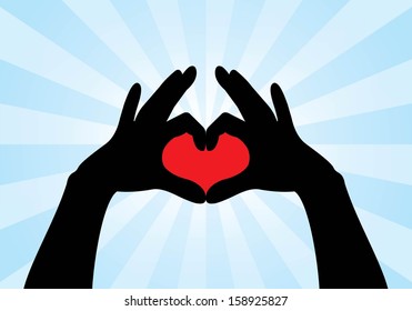 red heart shape made with hands 
