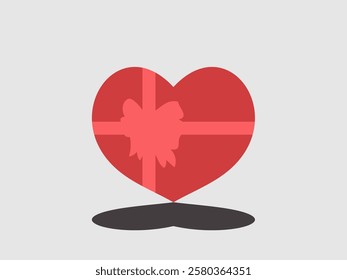 A red heart shaped box with a lighter red ribbon tied in a bow around it is centered against a light gray background