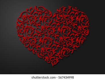 Red heart shaped floral pattern with leaves. Patterned 3d love symbol with shadow on dark background. Valentines day beautiful paper cut postcard