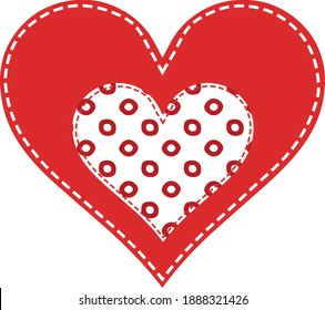 A red heart stitched with white Red heart stitched with white thread, inside the heart in red polka dots, patchwork