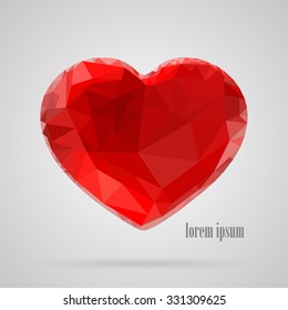 Red  heart in the style of triangulation on a white background