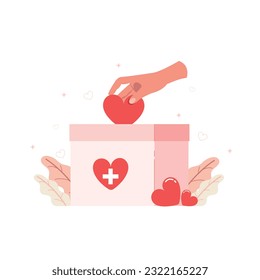 Red heart symbol is put by person's hand into donation box, charity and donation box concept.
