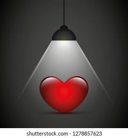 red heart under a hanging lamp on dark background vector illustration EPS10