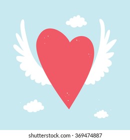 red heart with wings in the sky