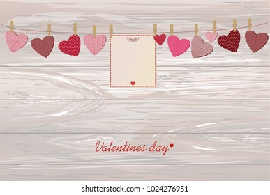 Red hearts and blank paper with a picture hanging on a rope. Valentine's Day. Vector illustration. Greeting card with empty space for your label or advertising. On a wooden background.