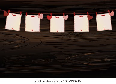 Red hearts and  blanks paper with a picture hanging on a rope. Valentine's Day. Vector illustration. Greeting card with empty space for your label or advertising. On a wooden background.