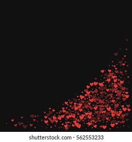 Red hearts confetti. Bottom right corner on black valentine background. Vector illustration.